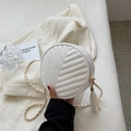 Chic white round quilted crossbody bag with golden chain strap and tassel detail - Off White