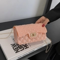 Pink quilted jelly bag with gold chain strap and metallic lock for elegant women - Pink