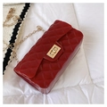 Chic red quilted jelly bag with glossy finish and elegant gold chain strap - Red