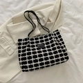 Large black and white checkered woven tote bag with leather straps and logo patch - Black