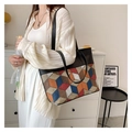 Grand sac cabas avec patchwork géométrique 3D et bandoulières en cuir noir chic - Carreaux Orange