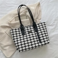 Classic black and white checkered tweed tote bag with elegant leather handles for women - White