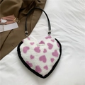 Bolso de peluche blanco con forma de corazón, motivos rosas y ribete de pelo negro - Rosa