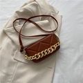 Deep brown quilted crossbody bag with gold chain strap and modern minimalist design - Brown