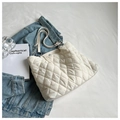White quilted tote bag with silver chain strap and puffy diamond texture design - White