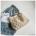 Quilted beige puffer tote bag with diamond pattern and metal chain strap details - Light Khaki