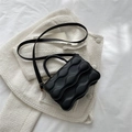 Minimalist black bubble-textured square handbag with top handle and gold hardware - Black
