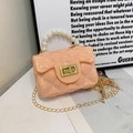 Mini coral orange jelly bag with quilted pattern, pearl handle, and gold chain strap - Pink