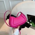 Chic magenta crescent shoulder bag in textured synthetic leather with silver hardware - Rose Red