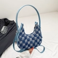 Blue denim checkerboard crescent bag with frayed edges and dual shoulder straps - Light Blue