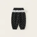 Pantaloni sportivi neri per bambine con stampe a fiocco e bordo in pizzo bianco - 80 / Nero