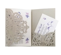 Detailed macro view of laser-cut champagne gold floral invitation with purple inner cards - Silver Grey