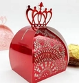 Elegant red laser-cut crown candy box with hollow lace patterns and pearlescent finish - Reflective Bright Red