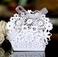 Elegant white laser-cut floral candy box with a delicate sheer ribbon bow for weddings - White