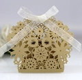 Laser-cut kraft paper favor box with flower pattern and white organza ribbon bow - Beige Gold