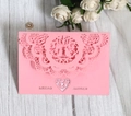 Pink laser-cut wedding invitation featuring intricate lace edges and bird motifs - Rose Pink