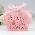 Pink laser-cut floral candy box with a decorative silk ribbon bow for wedding gifts - Pink