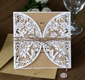 Close-up of laser-cut wedding invitation with butterfly patterns and kraft paper inlay - Butterfly Floral Style (HK-195)
