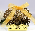 Elegant gold hollow flower candy box with a decorative organza ribbon bow for weddings - Reflective Gold