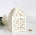 Elegant ivory laser cut wedding favor box with white ribbon bow and floral pattern - Ivory