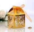 Elegant gold laser-cut candy box with orange ribbon for weddings and festive parties - Reflective Gold