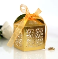 Elegant gold laser-cut favor box with intricate European floral pattern and orange ribbon - Mirror Gold