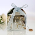 Mirror silver laser-cut candy box with floral hollow patterns and light blue ribbon bow - Reflective Silver
