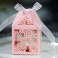 Laser-cut light pink wedding favor box with floral hollow patterns and white ribbon bow - Pink