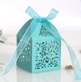 Elegant light blue laser-cut wedding candy box with intricate patterns and silk ribbon bow - Turquoise Blue