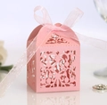 Elegant pink laser-cut lace candy box with pearlescent finish and soft silk ribbon - Pink