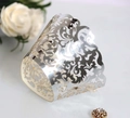 Silver laser-cut lace cupcake wrapper with intricate floral hollow design for party decor - Reflective Silver