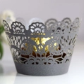Close-up of laser-cut lace cupcake wrapper in dark grey pearlescent paper finish - Silver Charcoal