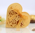 Golden heart-shaped wedding favor box with laser-cut rose patterns and ribbon - Gold