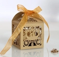 Elegant gold laser-cut pumpkin carriage wedding favor box with a delicate ribbon bow - Beige Gold