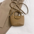 Mini sac seau kaki en similicuir grainé avec poignée ronde et bandoulière réglable - Marron