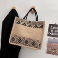 Minimalist beige jute tote bag with black geometric ethnic patterns and top handles - Totem Paisley