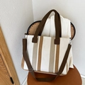 Vertical striped canvas tote bag with brown handles and adjustable crossbody strap - Off White