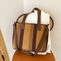 Earth tone striped woven tote bag with brown canvas straps and versatile wide shoulder strap - Yellow Brown