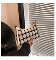 Elegant black and white tweed crescent shoulder bag with white leather strap and trim - White