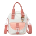 Pink and white canvas crossbody bag with cute cartoon badge and adjustable strap - Pink