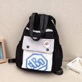 Black and grey drawstring bucket backpack in contrast nylon with rainbow badge and front pocket - Black Letter