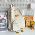 Mochila de pana blanco crema con diseño de pato amarillo y múltiples bolsillos - Blanco