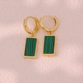 Detail view of gold hoop earrings with rectangular green malachite stone pendants - Drop Earrings