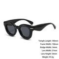 Gafas de sol redondas retro negras con montura gruesa y detalles de metal dorado - Montura Negra Lente Gris