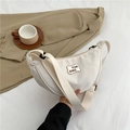 Chic cream-white crescent crossbody bag featuring an adjustable wide strap and wave patch - White