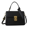 Minimalist black matte leather handbag with gold metal lock and adjustable strap - Black