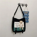 Bolso de lona en negro y verde con lindo oso de peluche y estampado de sonrisa - Negro