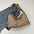 Minimalist khaki nylon shoulder bag with crescent shape and broad shoulder strap - Khaki