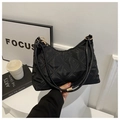 Classic black quilted shoulder bag with gold metal rings and elegant leather straps - Black