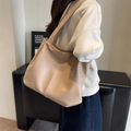 Minimalist apricot soft faux leather tote bag with vertical stitching for daily commute - Khaki